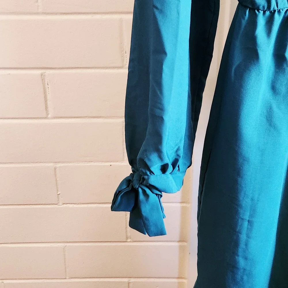 Madeline Sparklestein Teal V-Neck Ruffle‎ Hem Mini Dress Tie Cuff Long Sleeve L